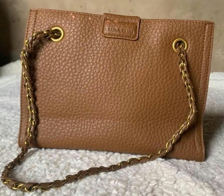 Tan pebbled tote with chain handles