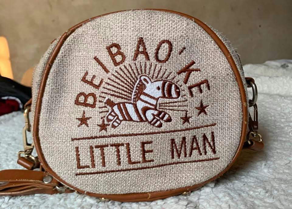 Embroidered canvas round crossbody