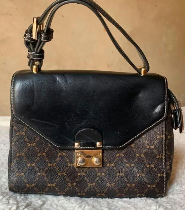 Black and brown print flap satchel