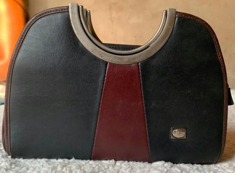 Black and burgundy colour-block handbag