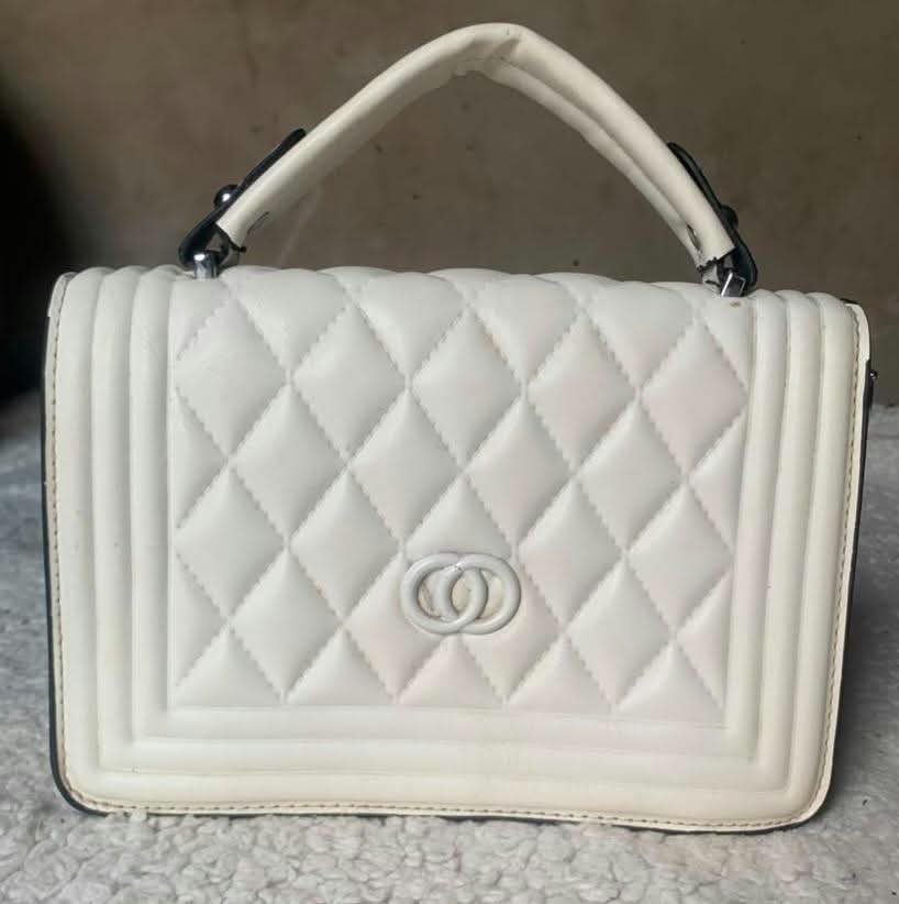White quilted top-handle flap bag