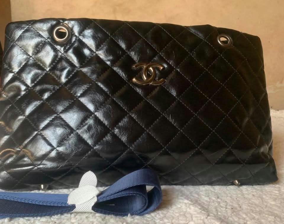 Black quilted patent shoulder tote